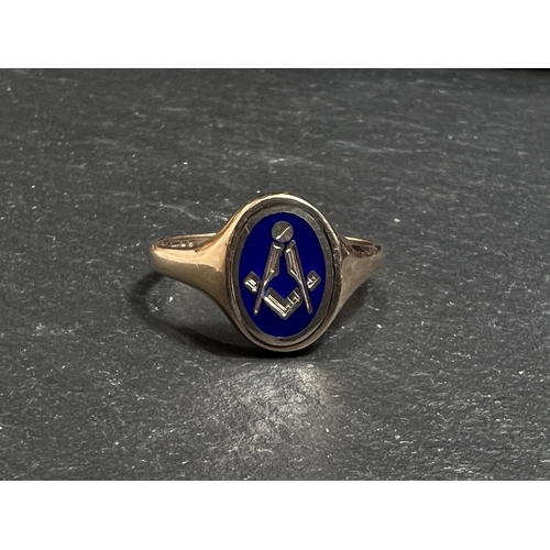 681 - A 9ct gold Masonic signet ring with blue enamel rotating panel, 5.3gm