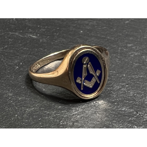 681 - A 9ct gold Masonic signet ring with blue enamel rotating panel, 5.3gm