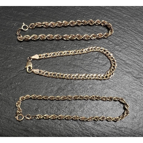 685 - Two 9ct gold rope twist bracelets and another 9ct gold chain bracelet, 9.4gms gross