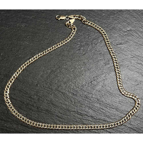 687 - A 9ct gold flattened curb link necklace, length 50cm, 21.8gm