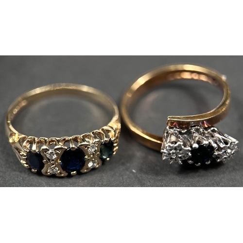 690 - A 9ct hallmarked gold gypsy style ring set with 3 sapphires, 2 diamond chips between each sapphire, ... 