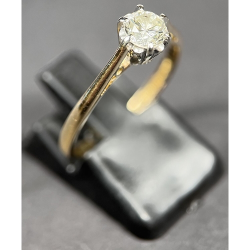 697 - A 9ct hallmarked gold dress ring set with solitaire diamond, diameter approx. 5mm, O and a half, 2.5... 