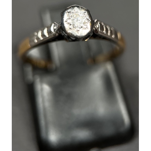 699 - Two small yellow metal rings with small diamonds in illusion settings stamped 18ct, 3.5gm gross