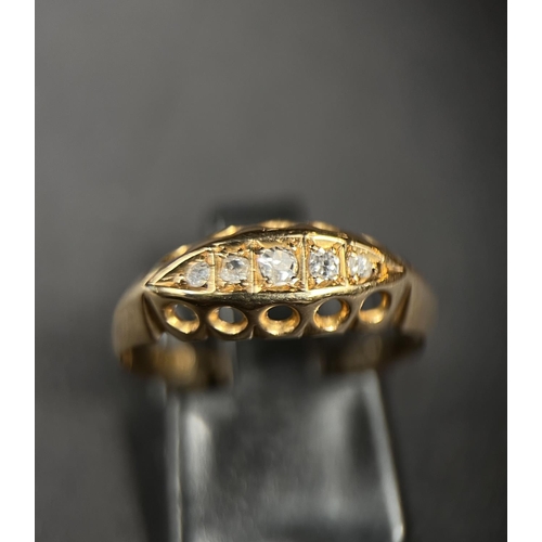 742 - An 18ct gold hallmarked gypsy ring in raised setting set with 5 diamonds, stamped and hallmarked siz... 