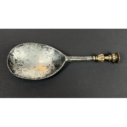 748 - A 16th/17th century iron and brass seal top anointing spoon with markers mark to bowl