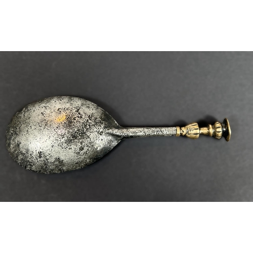 748 - A 16th/17th century iron and brass seal top anointing spoon with markers mark to bowl