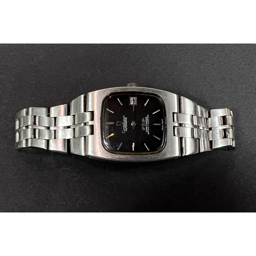 750 - An Omega Constellation automatic gents wristwatch with stainless steel link bracelet, black squared ... 