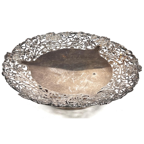 603 - A hallmarked silver shallow pedestal dish with floral pierced border, on circular foot, Sheffield 19... 