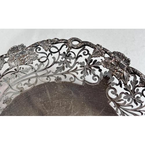 603 - A hallmarked silver shallow pedestal dish with floral pierced border, on circular foot, Sheffield 19... 