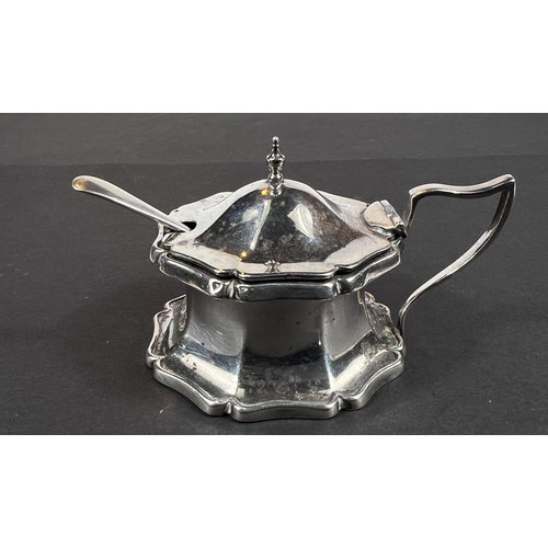 713 - A pair of ornate silver pepper pots and matching mustard pot (liner a/f), Birmingham, 1938, 5oz