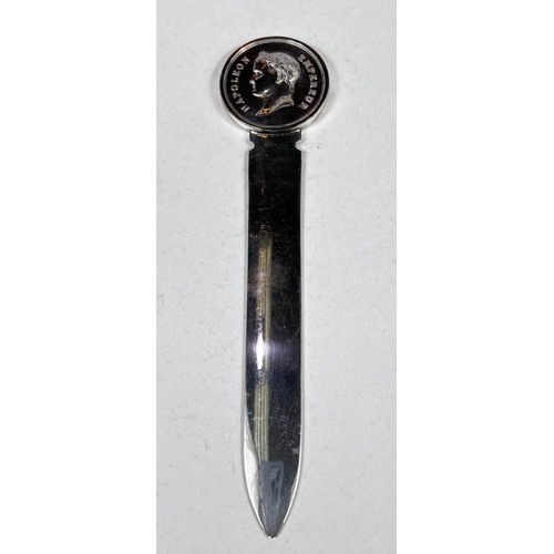 715 - CHRISTOFLE,  a silver plated paper knife with medal finial depicting Napoleon, 22cm