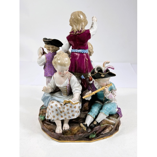 517 - A 19th century Meissen group of children in 18th century dress playing musical instruments, model B2... 