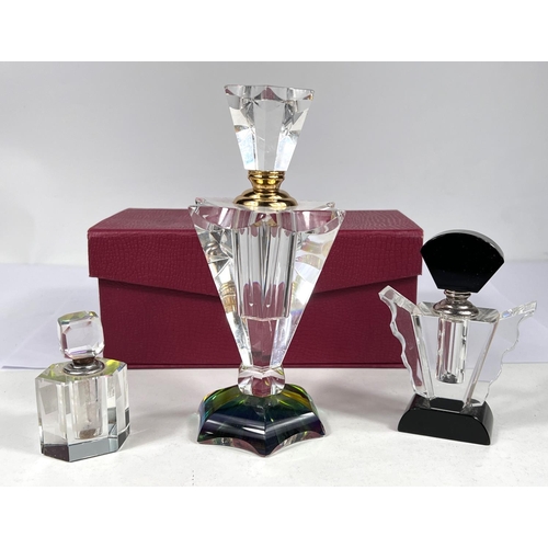 528 - A Waterford Crystal mantelclock;2 Art Deco glass scent bottles; a large crystal scent bottle, boxed