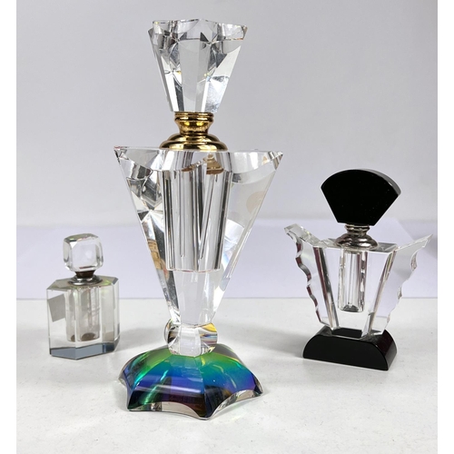 528 - A Waterford Crystal mantelclock;2 Art Deco glass scent bottles; a large crystal scent bottle, boxed