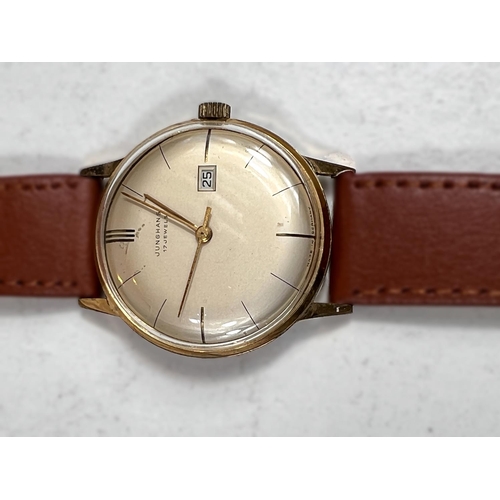 727 - A JUNGHANS gents wristwatch mechanical movement with date