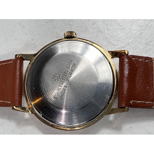 727 - A JUNGHANS gents wristwatch mechanical movement with date