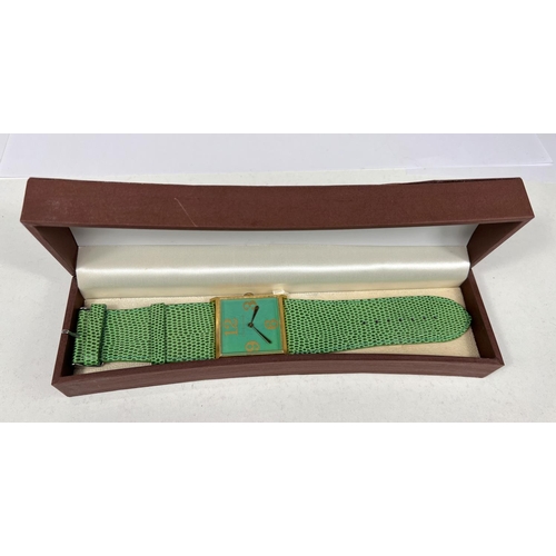 735 - A 1960's OLD ENGLAND POP watch, lizard skin effect strap