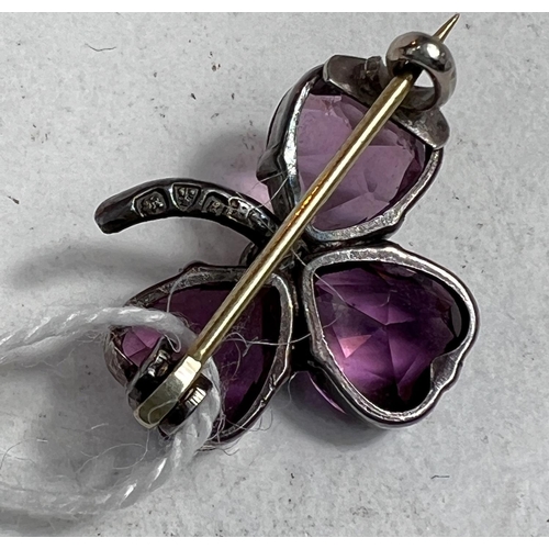 740 - CHARLES HORNER, a silver and amethyst trefoil brooch, 1905