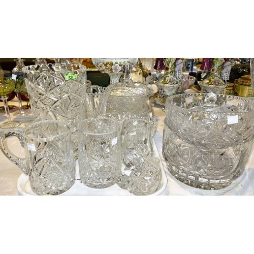 521 - A selection of cut crystal vases; bowls; jugs; etc.