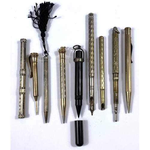 175 - A selection of gilt and white metal propelling pencils