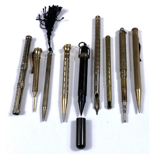 175 - A selection of gilt and white metal propelling pencils