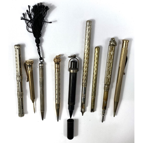 175 - A selection of gilt and white metal propelling pencils