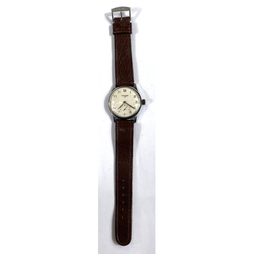 796A - A military style Longine gents wristwatch on leather strap, seconds dial