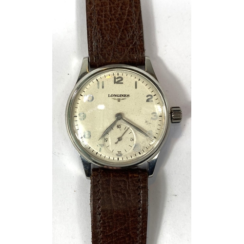 796A - A military style Longine gents wristwatch on leather strap, seconds dial