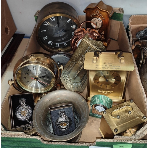24 - A collection of brass metalware:  mortar; clocks; etc.