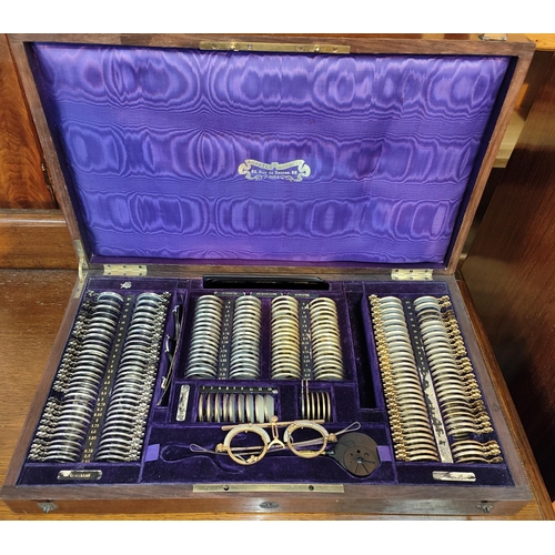 277 - A late 19th/ early 20th century stylish Optician's cased set of eye glasses, with purple interior Pa... 