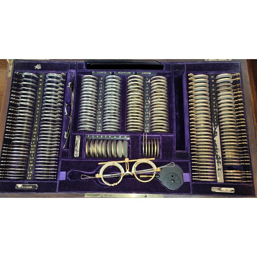 277 - A late 19th/ early 20th century stylish Optician's cased set of eye glasses, with purple interior Pa... 