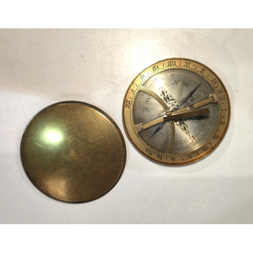 239 - A COMPASS/SUNDIAL, early 19th century, brass cased with engraved silvered dial, 66mm diameter case