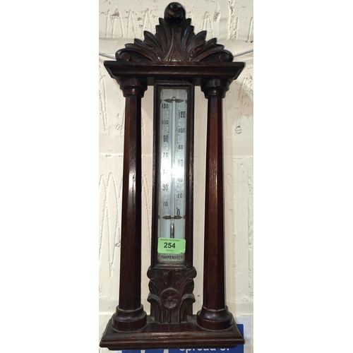 254 - A FAHRENHEIT SCALE WALL THERMOMETER, twin column oak frame, c. 1900, 46cm high