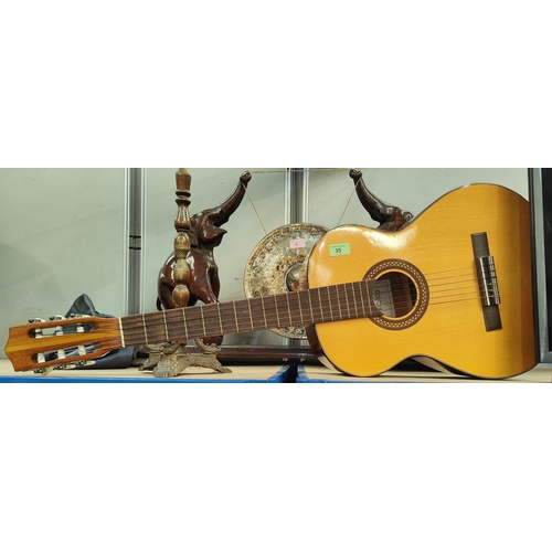 35 - A Spanish acoustic guitar, nylon strung