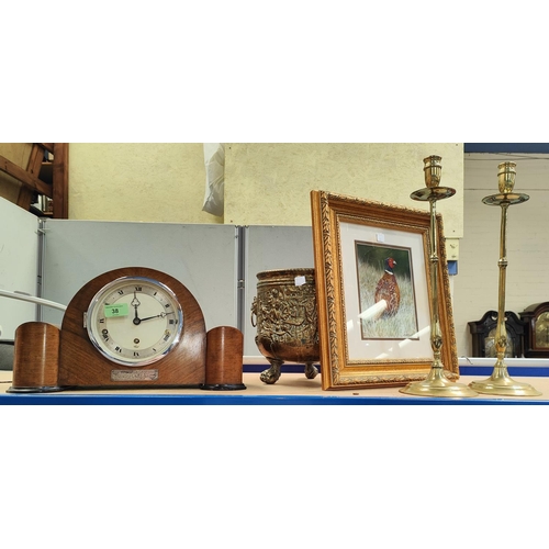 38 - An Art Deco mantle clock with chime, in walnut case; a brass jardinière; a pair of tall brass candle... 