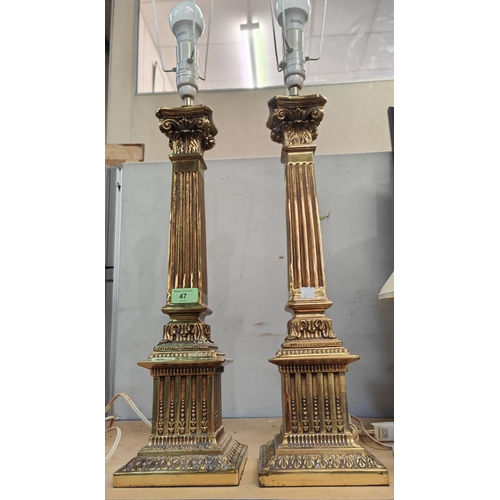 47 - A large pair of square fluted brass Corinthian column table lamps