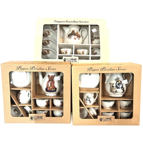 576B - Three Steiff dolls tea sets decorated with bears, boxed