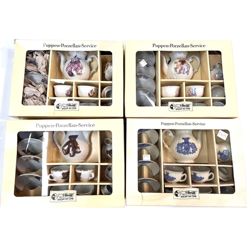 576D - Four Steiff dolls tea sets decorated with bears, boxed