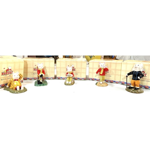 577 - Five Royal Doulton Rupert figures, boxed:  Rupert's silver trumpet; Ping Pong leading the way; Somet... 