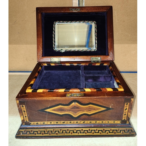 69 - A BRITISH COLONIAL mahogany sewing box of sarcophagus form, extensive geometric inlay probably Jamai... 