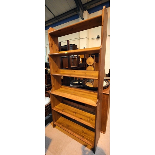 869 - A modern pine 6 height bookcase