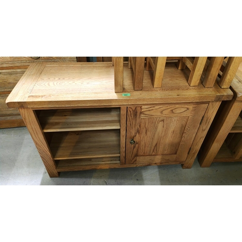 882 - A modrn light oak side cabinet with open shelves and cupboard