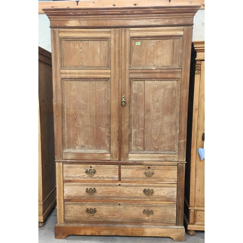 901 - A late 19th century stripped ash linen press in the Arts & Crafts manner with two long and two s... 