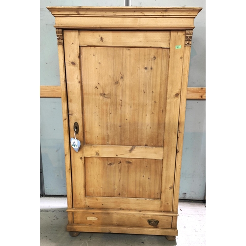 904 - A Victorian stripped pine single door wardrobe with panelled door, ht. 185 x 101 x 48cm (drawer miss... 