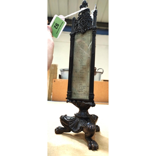 92 - A FRENCH EMPIRE bronze letter rack with thermometer and calendar of triangular section with 3 animal... 