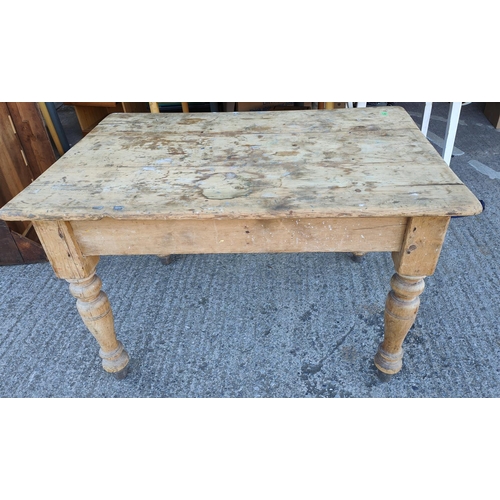 923 - A Victorian stripped pine rectangular kitchen table with drawer to one end, 180 x 72 x 82cm