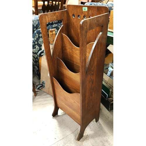 924 - An oak Art Deco magazine stand, a wall hanging shelf unit and a folding chair