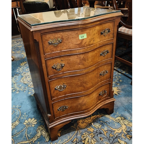 939 - A reproduction walnut dwarf chest of 4 drawers with serpentine front, width 50cm