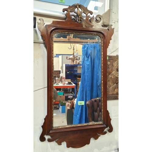 941 - A wall mirror in Chippendale style fretwork frame, width 105cm; a similar mirror