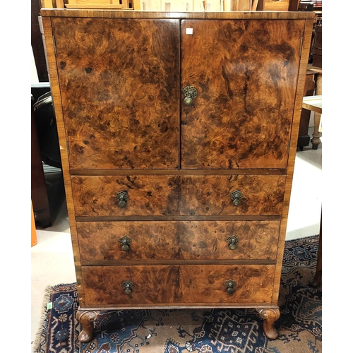 950 - A 1930's figured walnut 3 piece bedroom suite comprising tallboy, kidney shaped dressing table and s... 